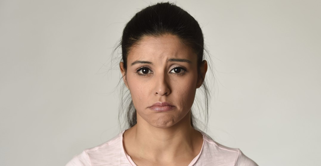 Woman saying sorry in english