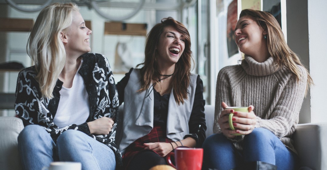 friends laughing at old-fashioned English sayings