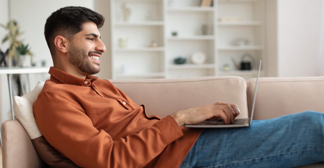 man watching german youtubers to learn german