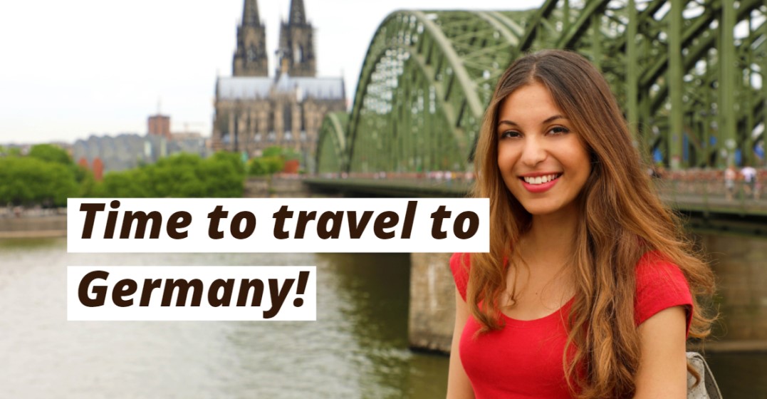 A girls in front of Hohenzollernbrücke in Germany practicing phrases for travel