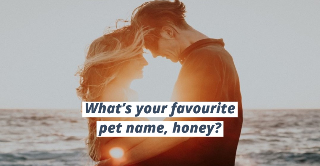 Couple at the beach giving each other pet names