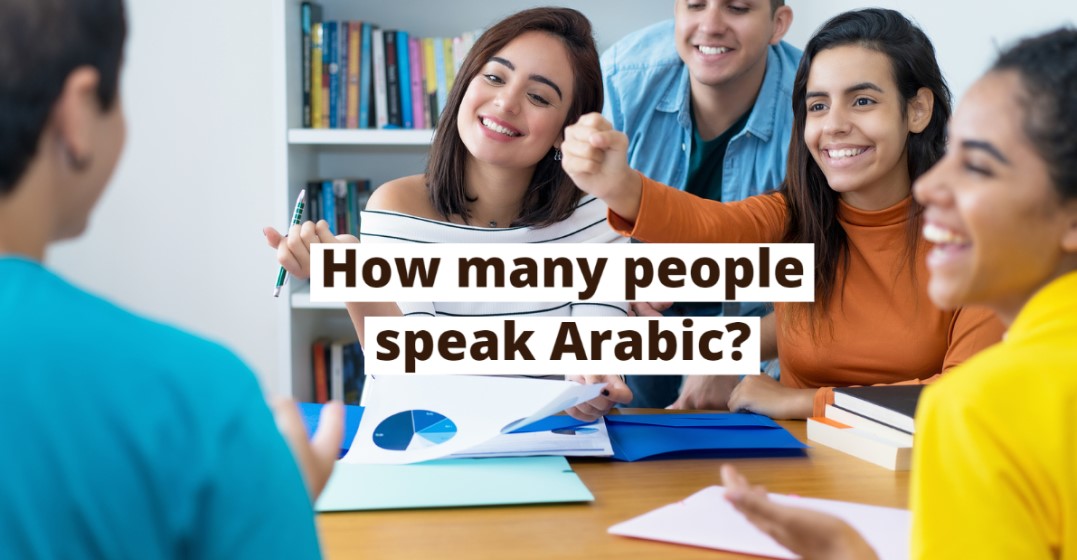 Smiling group of friends at a table discussing how many people in the world speak Arabic