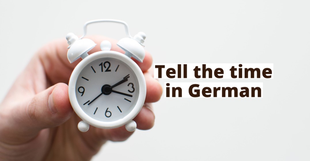 A clock on a banner with the headline 