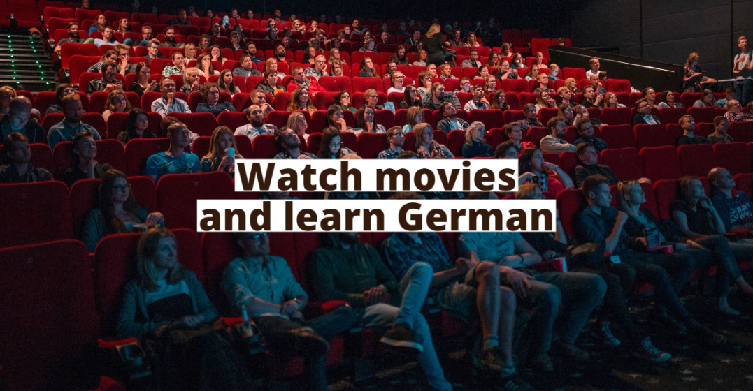 A movie theatre with a banner saying 
