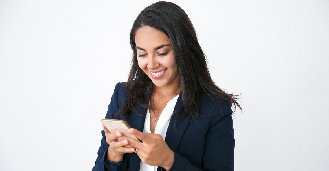 Smiling woman using one of the best offline translation apps