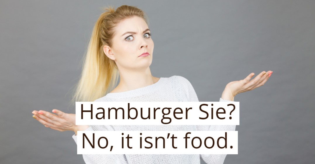 An astonished looking woman asking herself if German is a formal or informal language