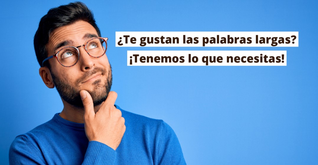 Un hombre con cabello castaño y anteojos mira hacia el cielo con un fondo azul. Se pregunta cuál es la palabra más larga del mundo.