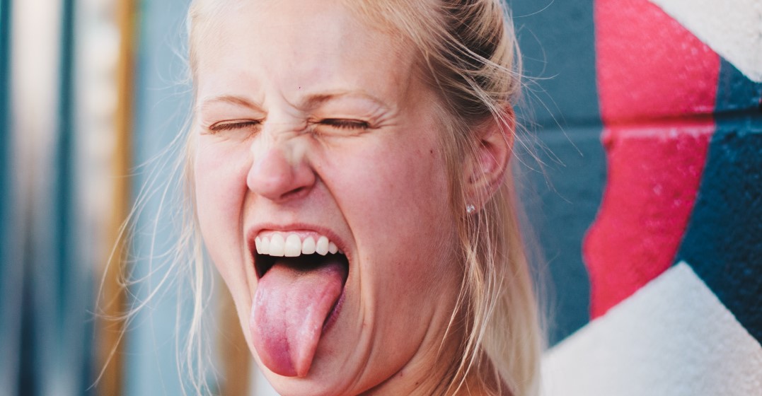 woman trying to say the best tongue twisters in English