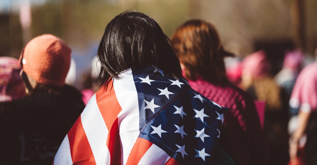 Official language in the US: woman wearing a united states flag