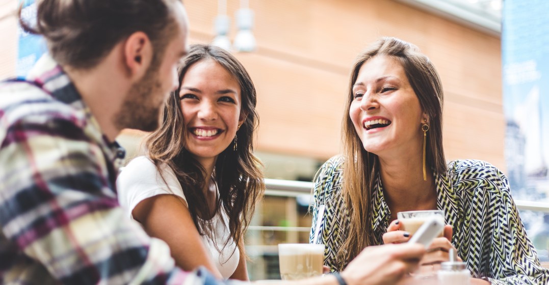 friends laughing at tongue twisters in spanish