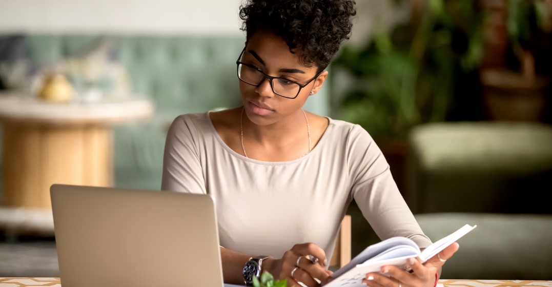 woman studying Basic German verbs and conjugation