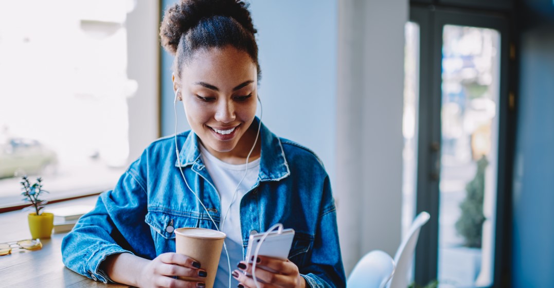 woman looking up german business culture on her mobile