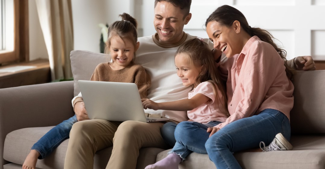 family looking online how to enrol kids in french schools