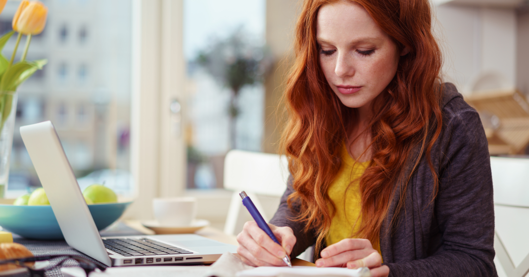 woman checking her work contract in germany and signing to start work