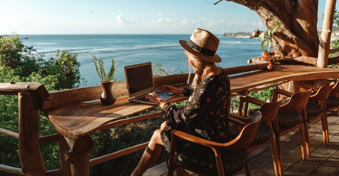 Freelance, platform.,Pretty,Young,Woman,Using,Laptop,In,Cafe,On