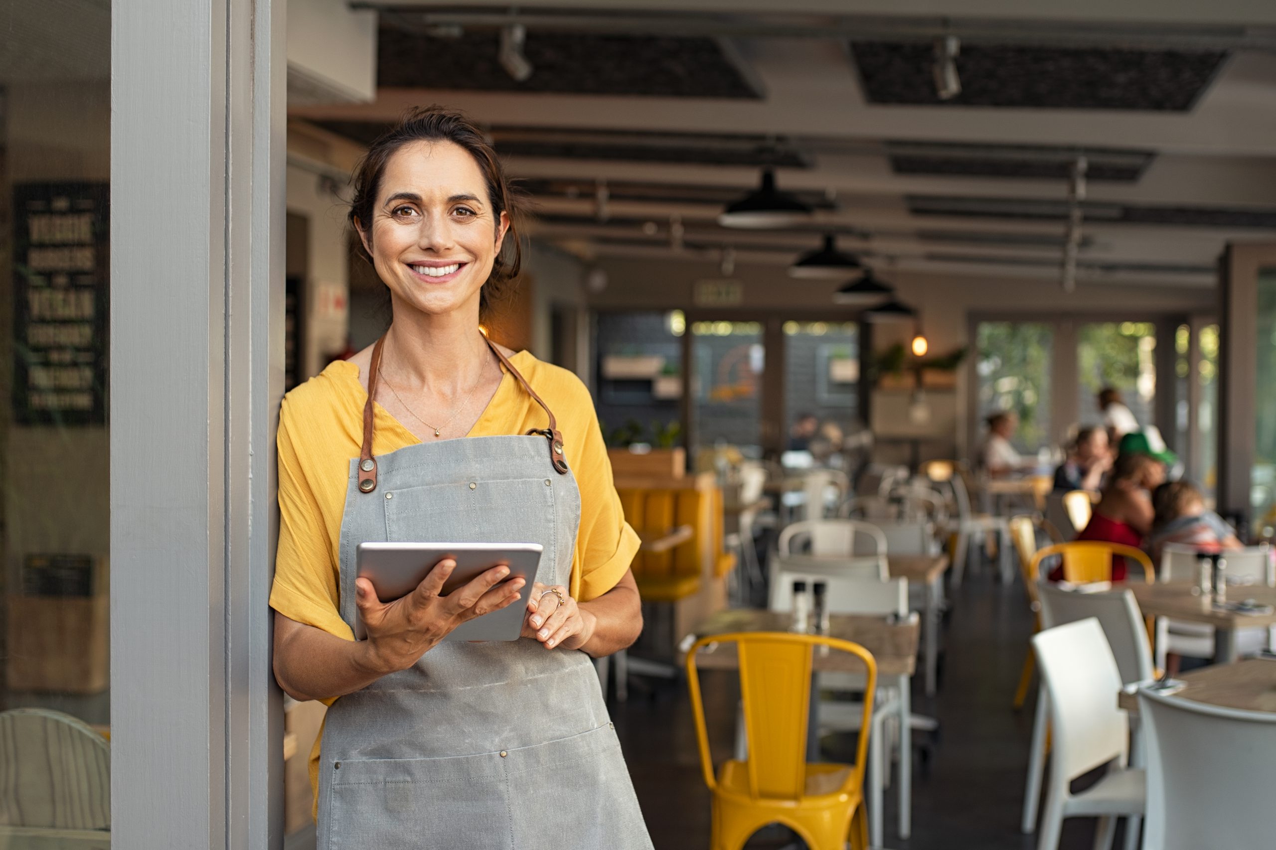 Waitress in a French restaurant, taking food orders