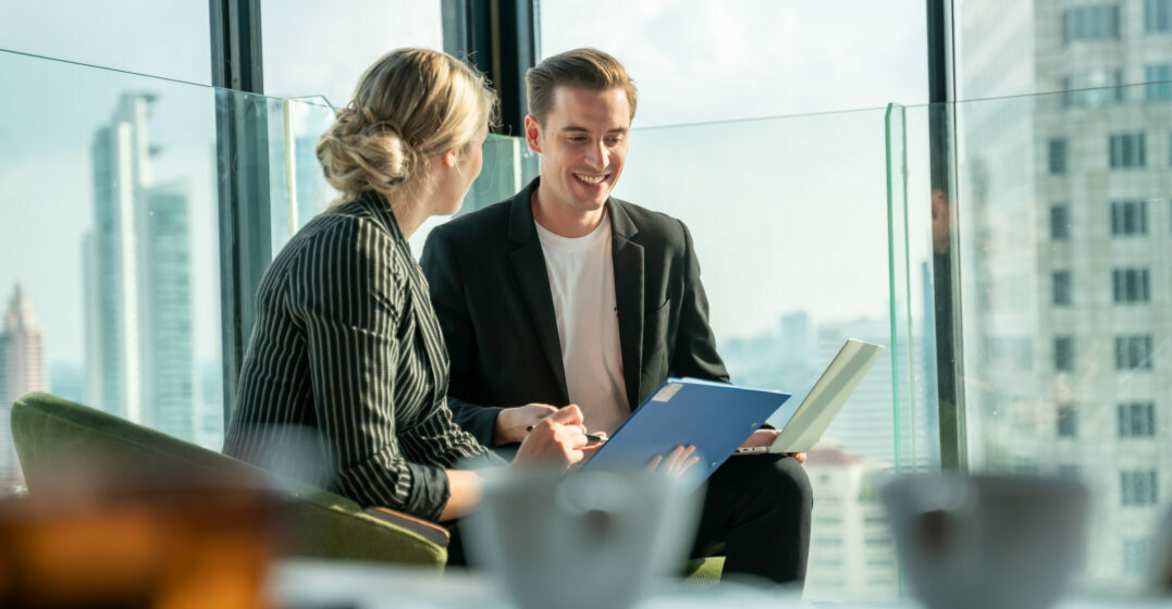 Two people exchanging sports idioms in business English