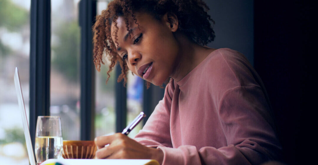 French adjectives - young woman studying