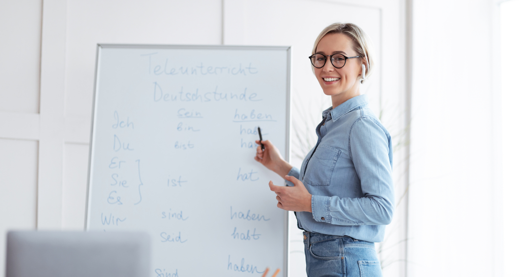 german teacher teaching students denglish words