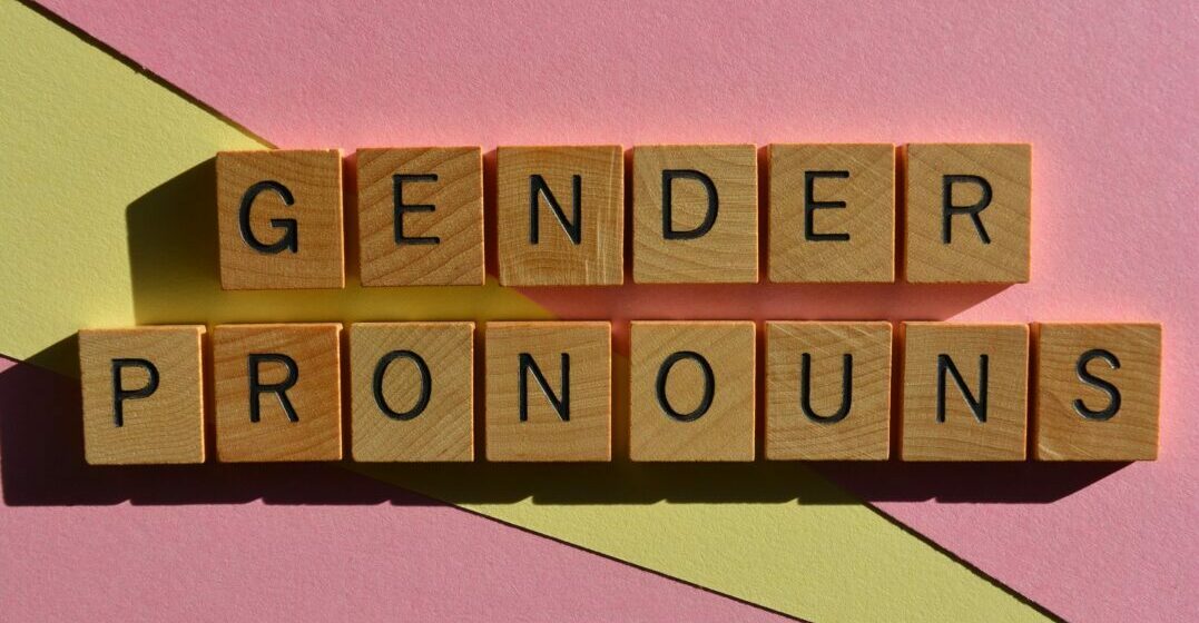 Wooden letters forming the words gender (neutral) pronouns