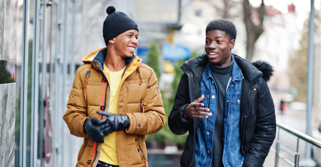 two black american men speaking and discussing what is aave