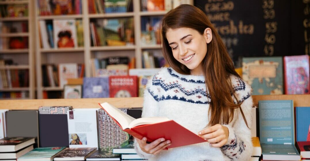 Woman holding a book that has won the GOncourt prize
