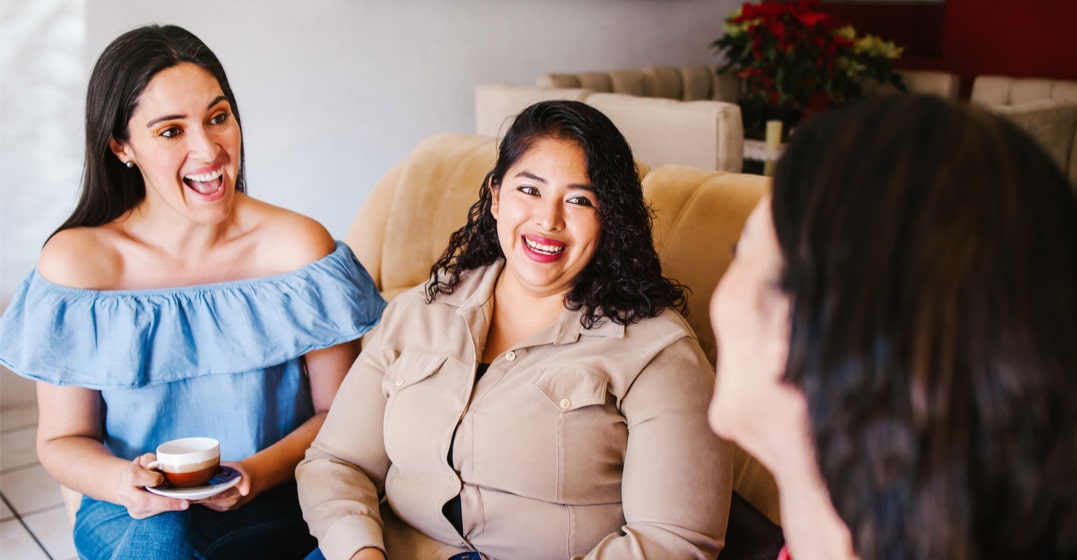 a group of women talking about english pronunciation tips for spanish speakers