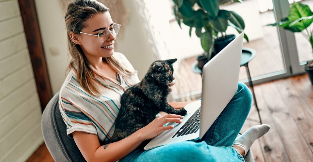 Woman with her cat learning the animals in French