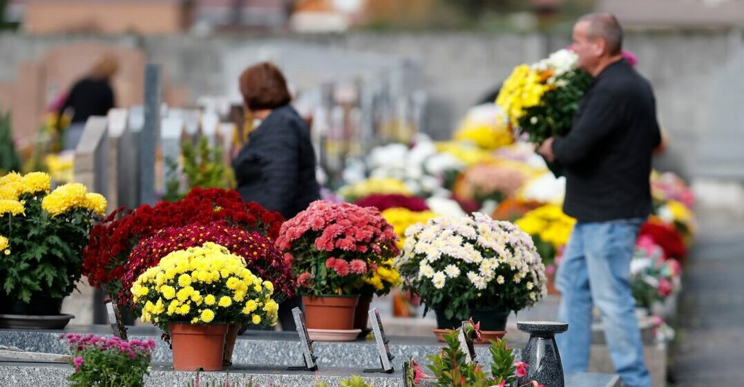 People in the cemetery on All Saints' day in France