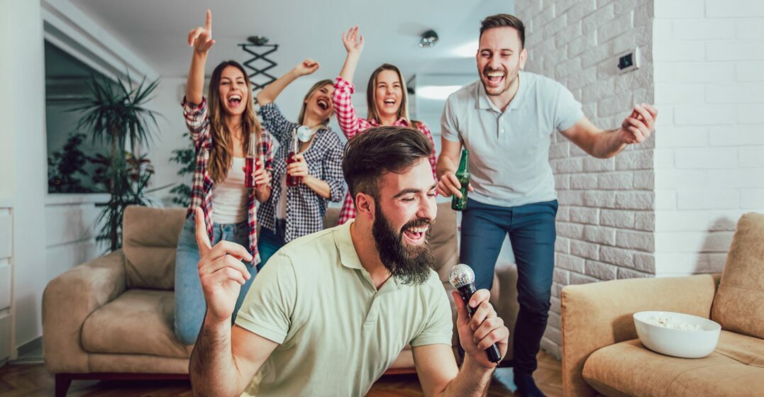 Friends singing songs from German singers