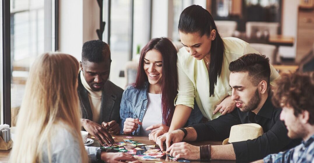 Group of friends playing French games