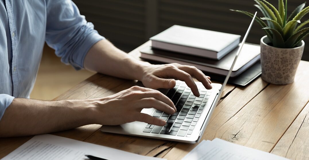 Person at a laptop looking for the German double s on the keyboard