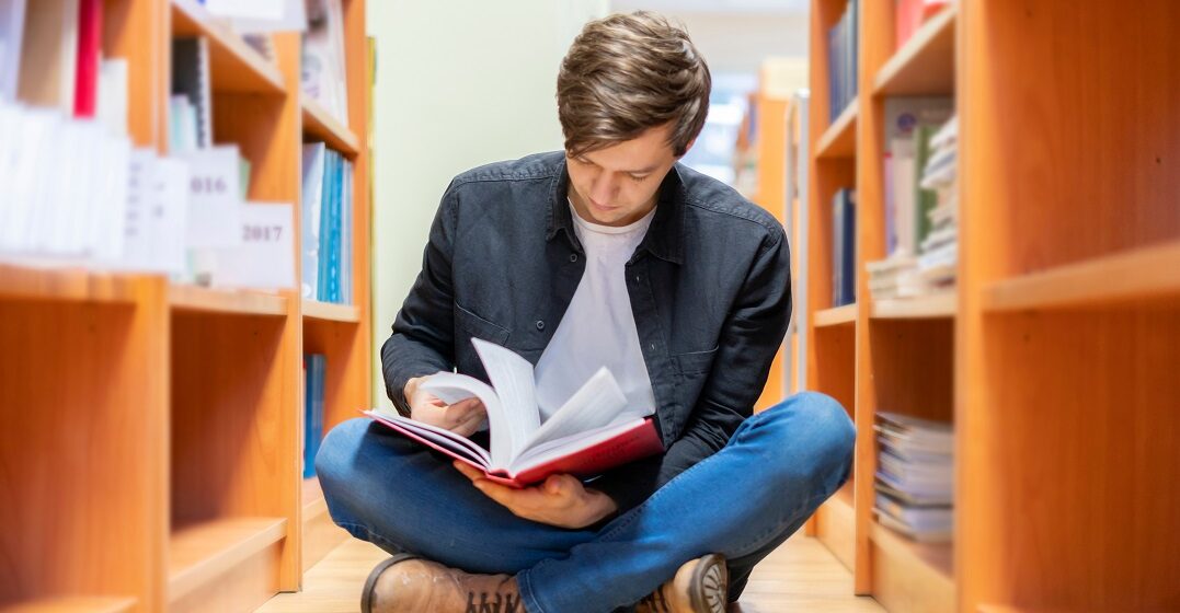 Man looking at slang words' origin