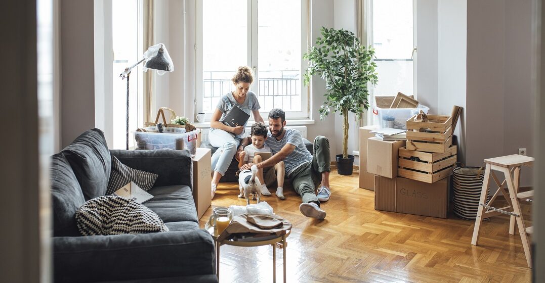 A family moving in to a new apartment after learning how to rent an apartment in France