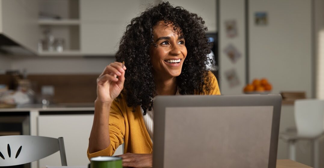 Young woman checking how many countries speak Spanish