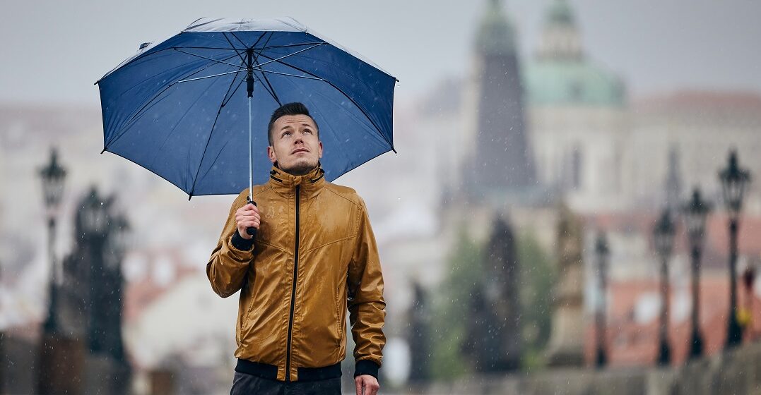 Man with an umbrellla in one of the coldest cities in Germany