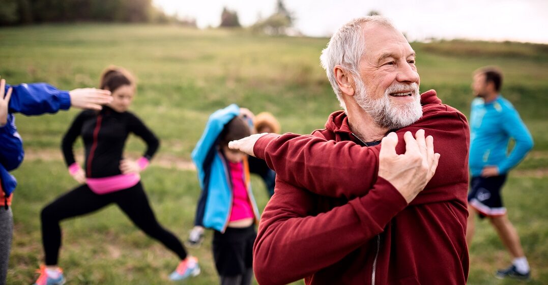 A fit elderly man doing a workout representing the high life expectancy in Germany
