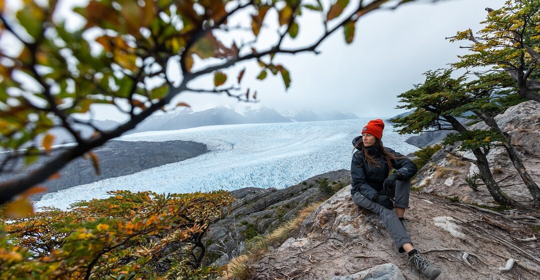 A young woman is moving to Chile and is climbing one of the mountains there