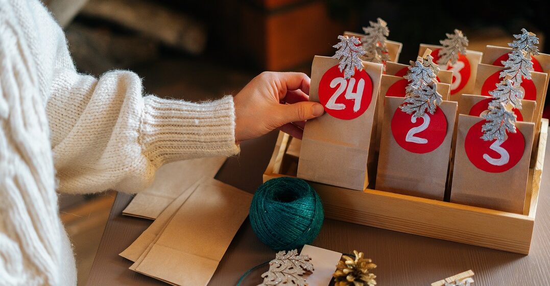 A close up of a hand-crafted advent calendar- one of the best Christmas gifts from Germany