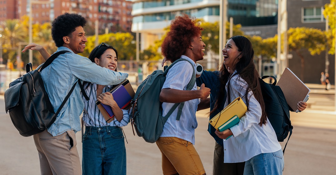 Young happy people saying hello to each other in Swiss German
