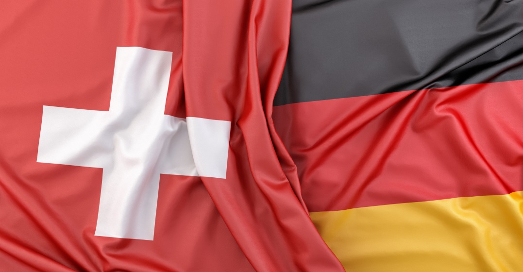 German and Swiss flag next to each other