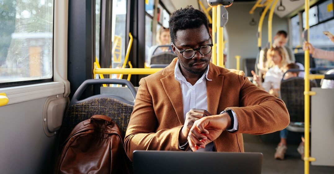 African,American,Businessman,In,Elegant,Suit,Traveling,By,Bus,To