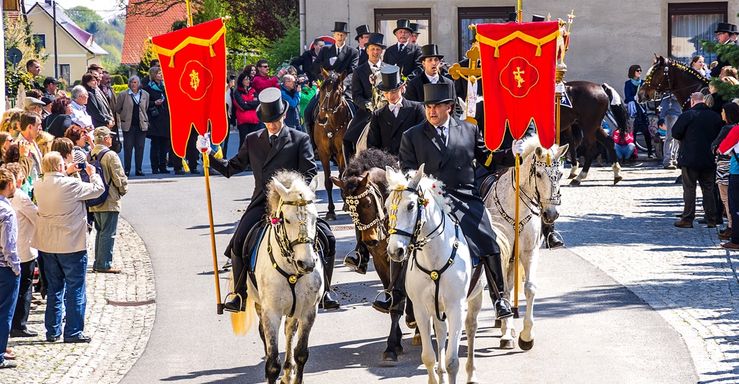 Sorbian men on the easter ride speaking the sorbian language