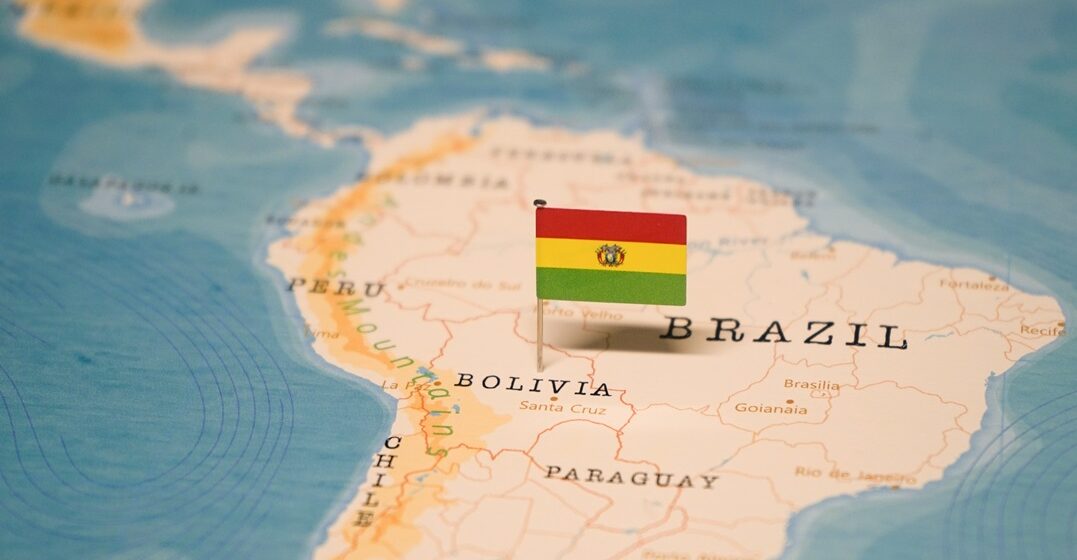 The,Flag,Of,Bolivia,On,The,World,Map.