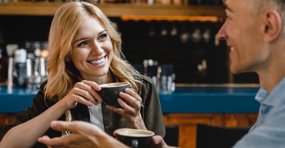 Two chatting with a coffee while on a date in Switzerland