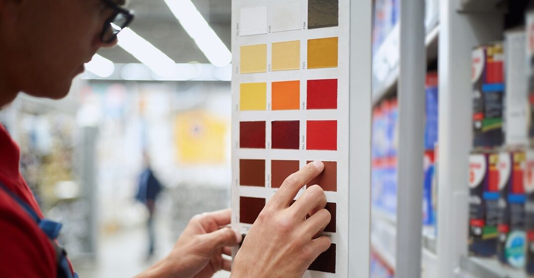 Man,Choosing,A,Suitable,Sample,Of,The,Desired,Paint,.