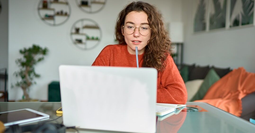 Young,Woman,Female,Student,Using,Laptop,Elearning,Or,Remote,Working