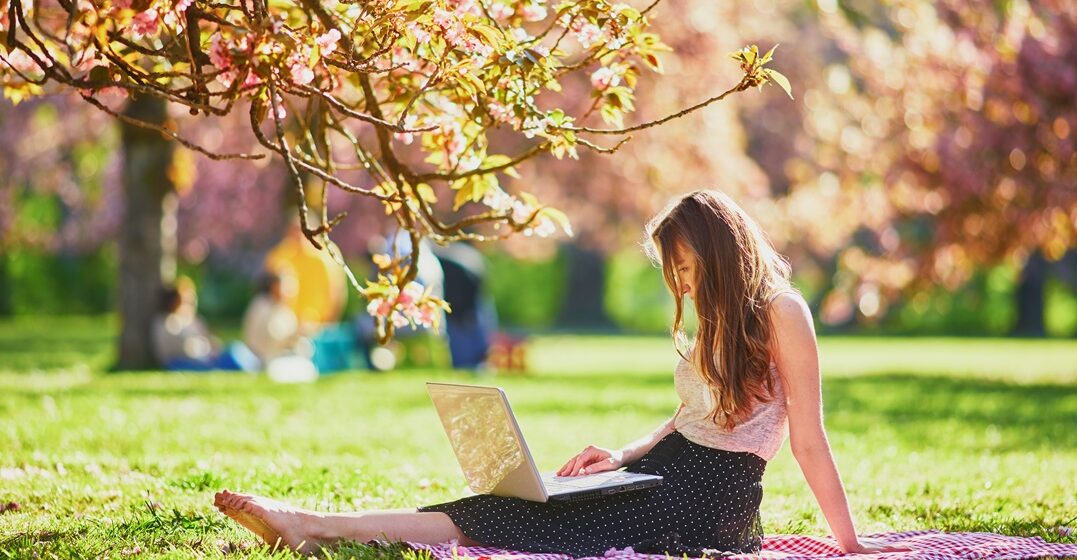 Young woman in France looking how to learn French