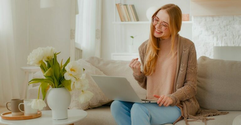 being a businessman essay Woman sitting on couch cheering as she took as assessment test for her language levels