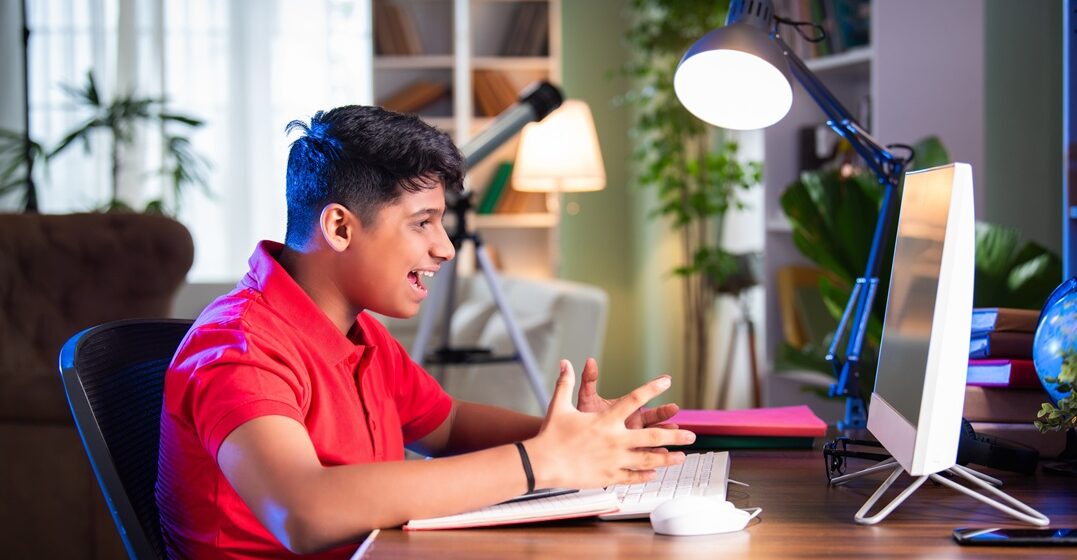 young man learning online about german language accents